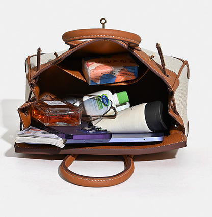 Jane Riviera 25 – Bolsa em Couro Genuíno Togo e Lona Platina