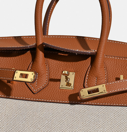 Jane Riviera 25 – Bolsa em Couro Genuíno Togo e Lona Platina