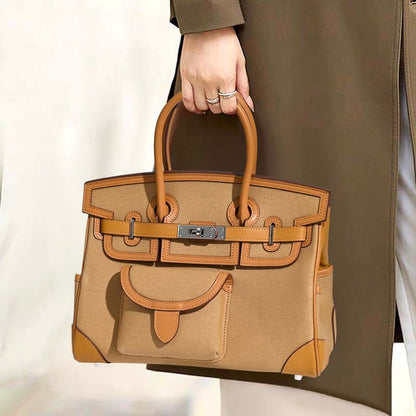 Jane Explorer 30 – Bolsa em Couro Togo e Lona Premium