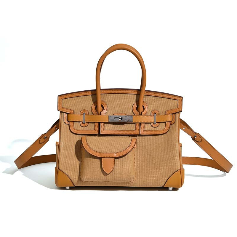 Jane Explorer 30 – Bolsa em Couro Togo e Lona Premium