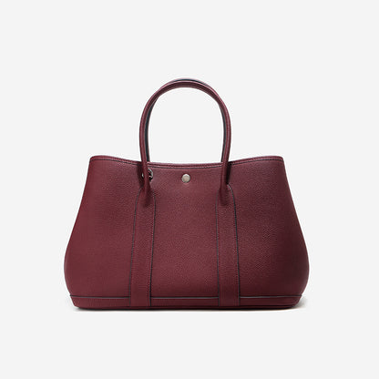 Brigitte – Bolsa Elegante em Couro Genuíno Estilo Togo